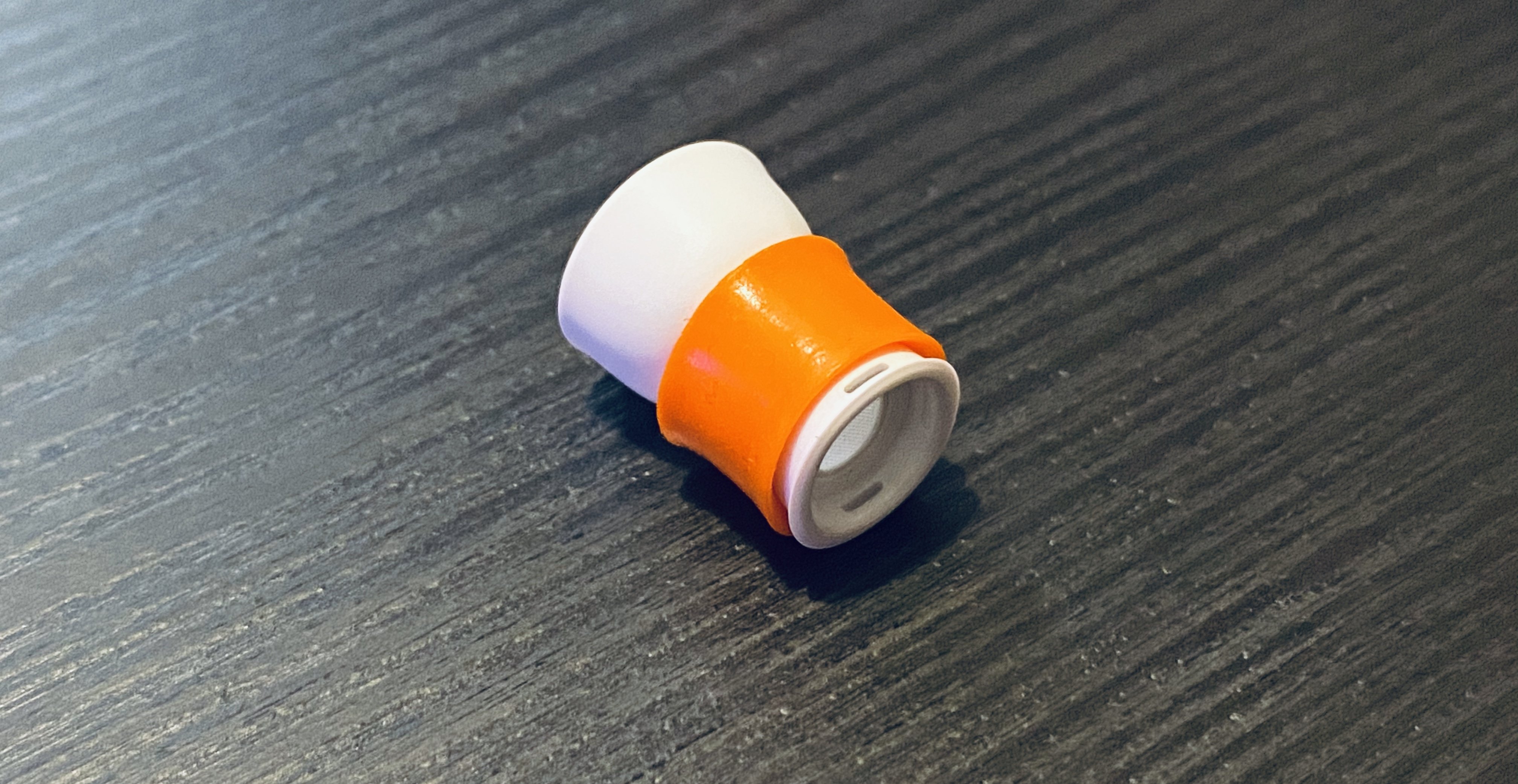 Fit the foam layer around the plastic stem of the AirPods Pro tip.